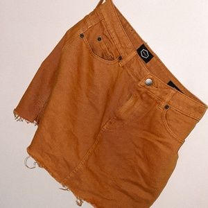 Orange denim skirt.